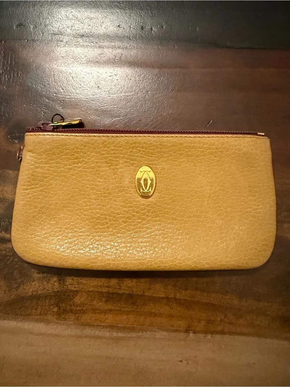 Cartier Yellow-Tan Leather Zip Wristlet with Gold Emblem